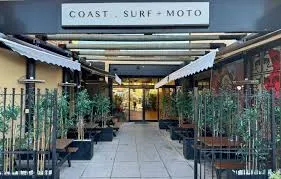 Coffee and surf gear at Coast Surf Moto in Lilliput
